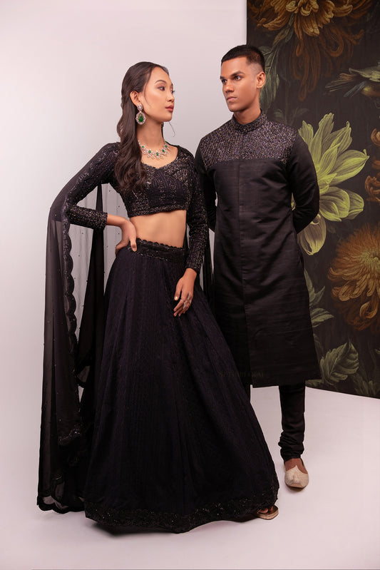 Black hand embroidered chikankari lehenga and sherwani couple ensemble