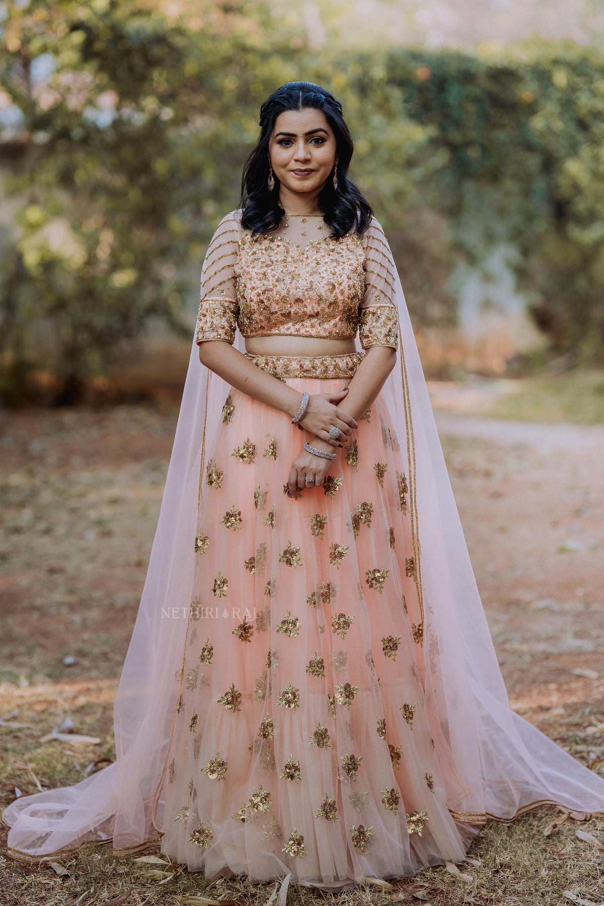 Peach Antique Net Lehenga