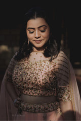 Peach Antique Net Lehenga